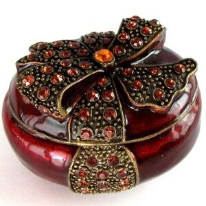 Burgundy and brass ring/trinket box